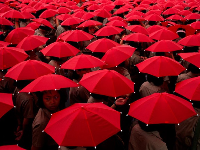 Schoolchildren With Umbrellas by Jodi Cobb